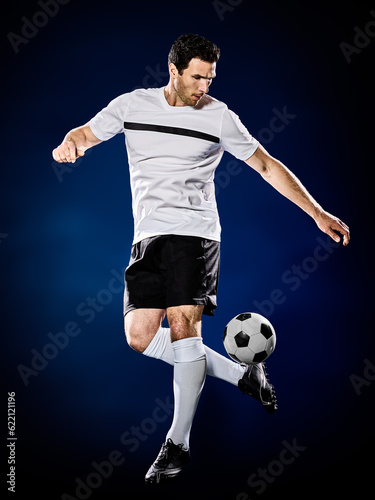 one caucasian soccer player man isolated on black background © Designpics