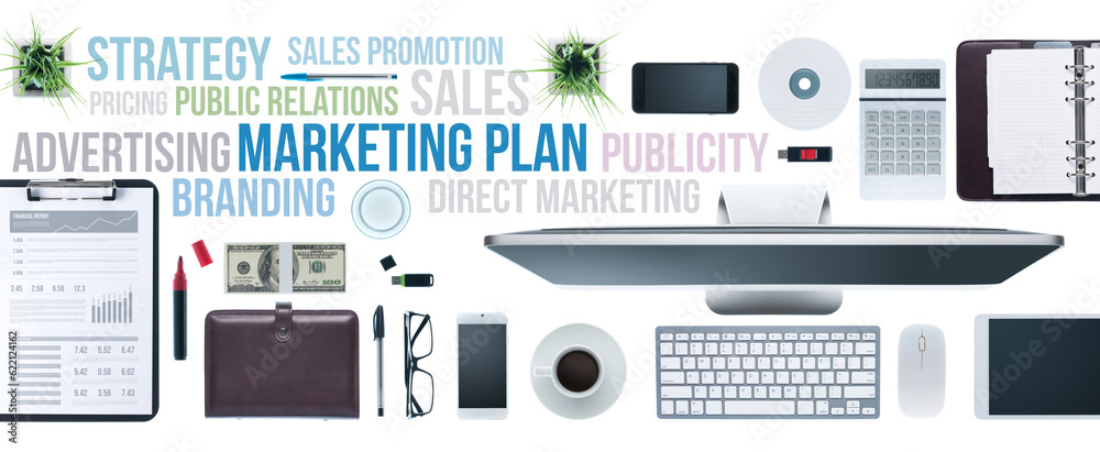 Marketing and communication concepts on a business desktop with computer, tablet and smartphone, top view Marketing and communication concepts on a business desktop with computer, tablet and smartphone, top view