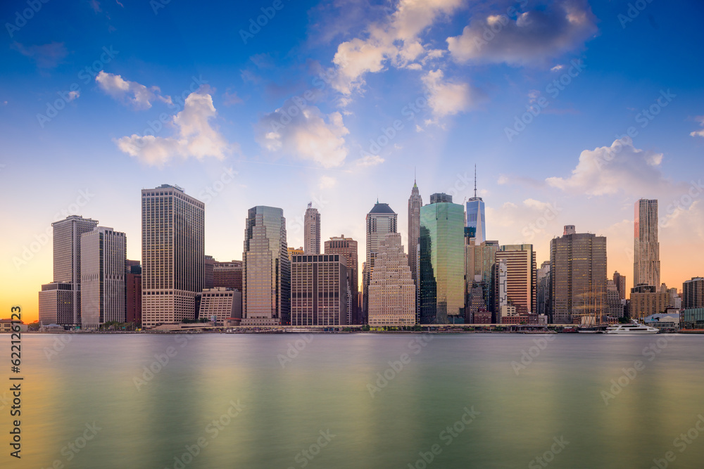 New York City, USA lower Manhattan skyline on the East River.