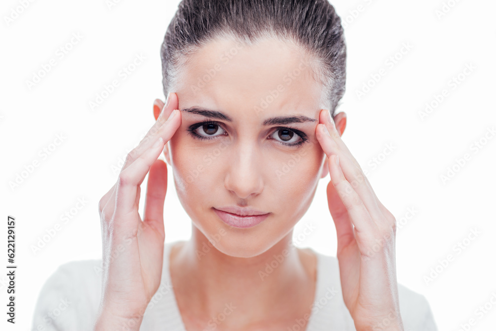 Beautiful young woman with headache touching her temples Beautiful young woman with headache touching her temples