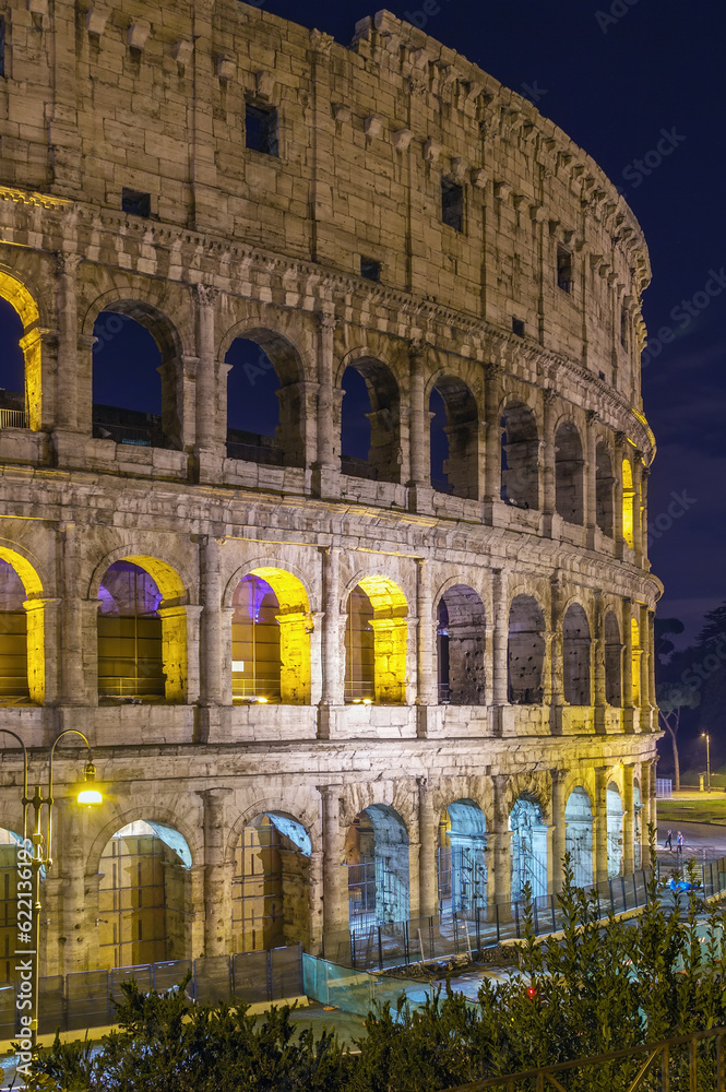 The Colosseum or Coliseum, also known as the Flavian Amphitheatre is an elliptical amphitheatre in the centre of the city of Rome, Italy. Evening