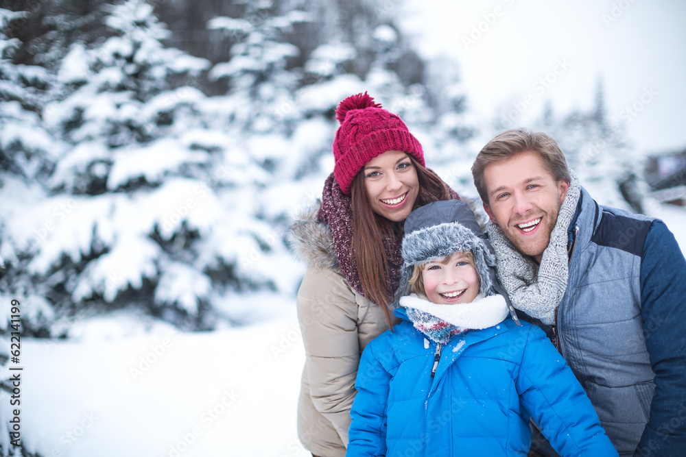 Fototapeta premium Family at winter forest