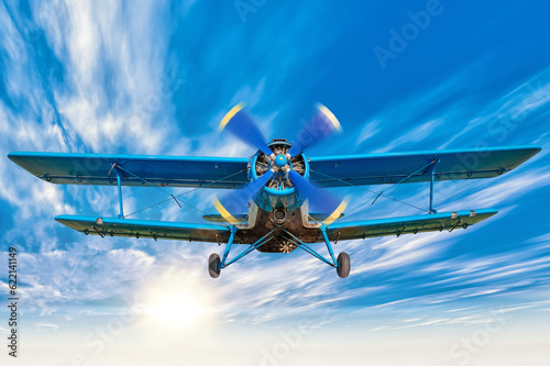 Fototapeta Naklejka Na Ścianę i Meble -  picture of a biplane in the blue sky