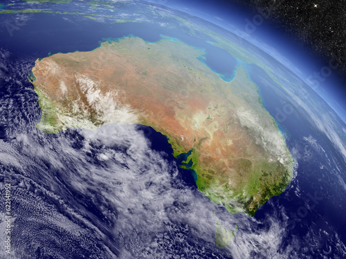 Fototapeta Naklejka Na Ścianę i Meble -  Australia with surrounding region as seen from Earth's orbit in space. 3D illustration with highly detailed planet surface and clouds in the atmosphere. Elements of this image furnished by NASA.