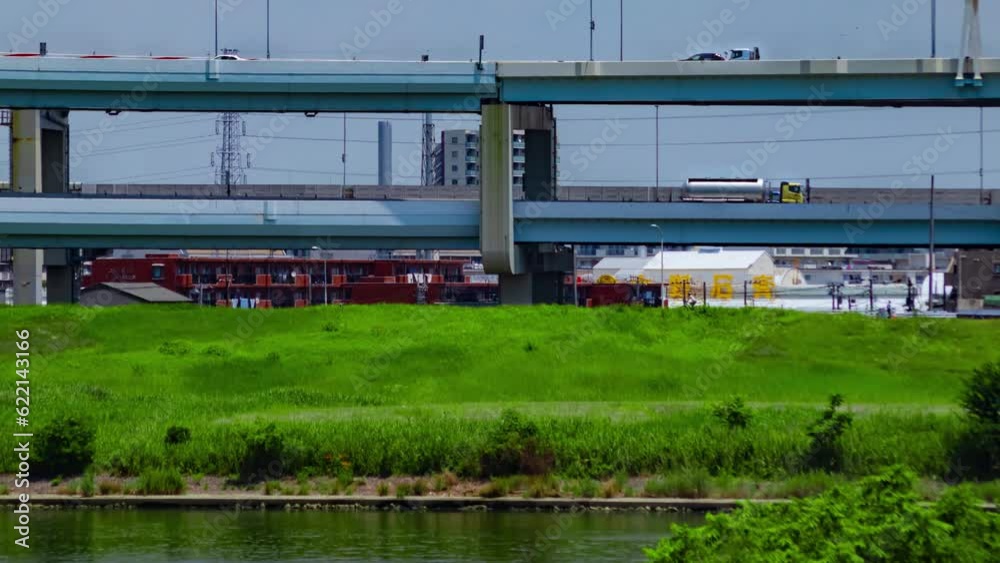 A timelapse of traffic jam at the downtown street and highway telephoto shot panning A timelapse of traffic jam at the downtown street and highway telephoto shot panning