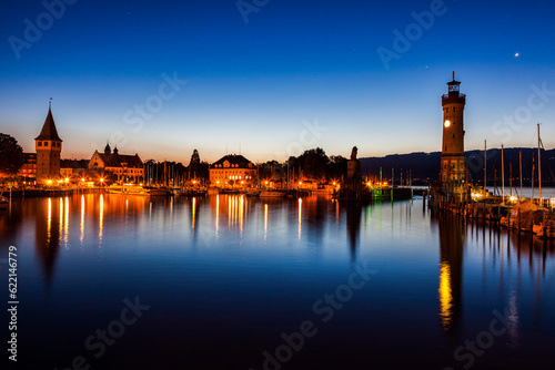 Lindau Lighthouse seen before sunrise. Lindau, Bavaria, Germany.