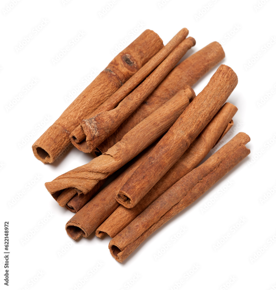 Cinnamon sticks isolated on white background. Top view. Cinnamon sticks isolated on white background. Top view.