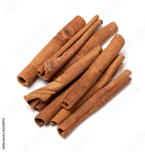 Cinnamon sticks isolated on white background. Top view.