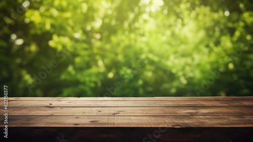 Empty wooden table with green background