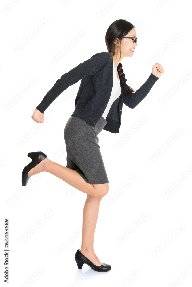Full body portrait of young Asian woman running, isolated on white background.