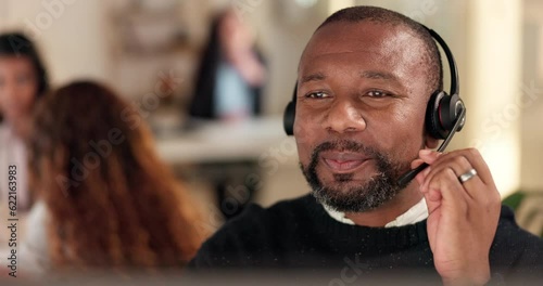 Face, call center and a black man talking with a headset for customer service, advise or crm. Happy person working late at office for telecom, telemarketing or technical support at help desk