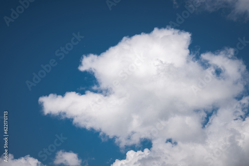 Soft white cloud and blue sky background. Large cumulus clouds. Close-up