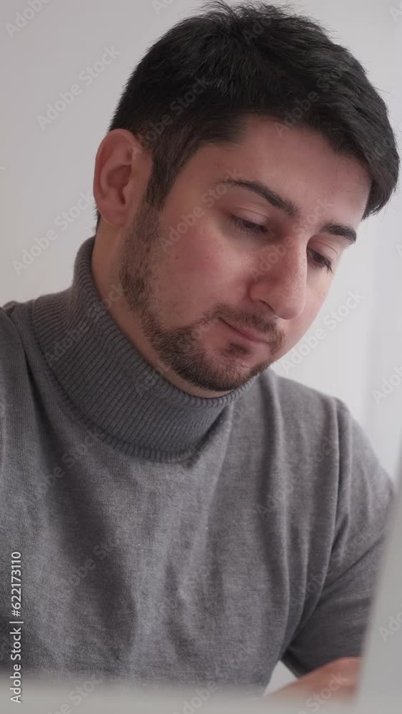 Vertical video. Tired employee. Work deadline. Overwork fatigue. Sleepy exhausted stressed business man workaholic upset with job burnout at laptop. Vertical video. Tired employee. Work deadline. Overwork fatigue. Sleepy exhausted stressed business man workaholic upset with job burnout at laptop.