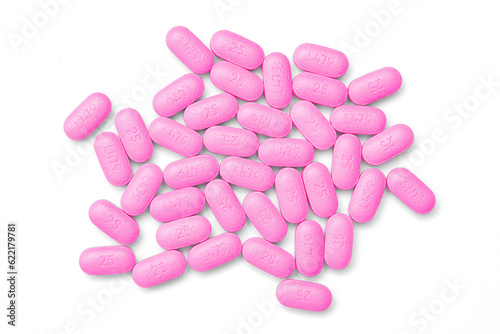 Pink diphenhydramine allergy pill in a pile isolated with transparent shadow photo