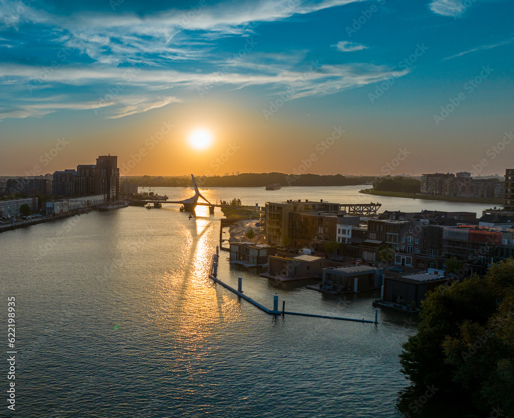 Naklejka premium sunset over the river