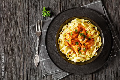 Creamy Paprika Pork Chunks over tagliatelle noodle