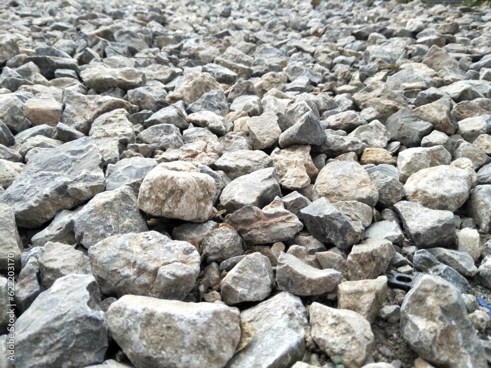 pebbles that function to withstand flooding in the yard of the house