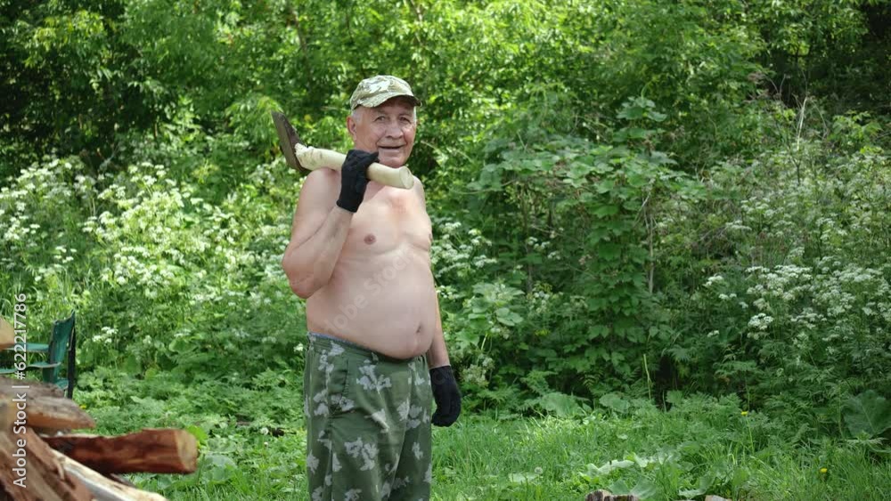 Adult man in rural area looking at camera