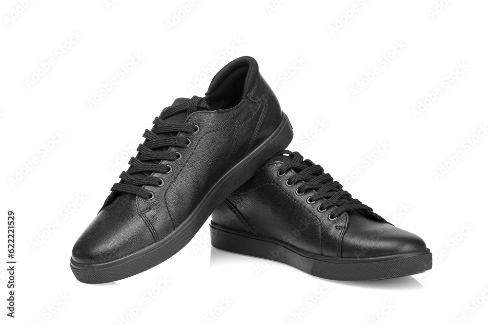 black leather sneakers on a white background