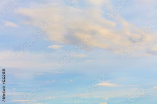 Fototapeta Naklejka Na Ścianę i Meble -  Panoramic view of clear blue sky and clouds, Blue sky background with tiny clouds. White and pearl fluffy clouds in the blue sky at sunrise. Atmosphere background or wallpaper