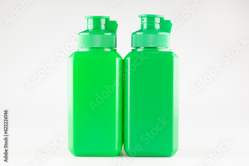 green plastic medical jars with lids