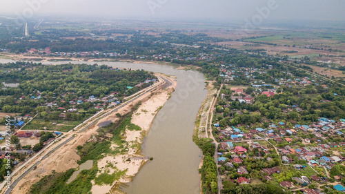 River of the Chao Phraya River in Sing Buri Province flows through a long way to Bangkok An old picture depicting the lives of the countryside.