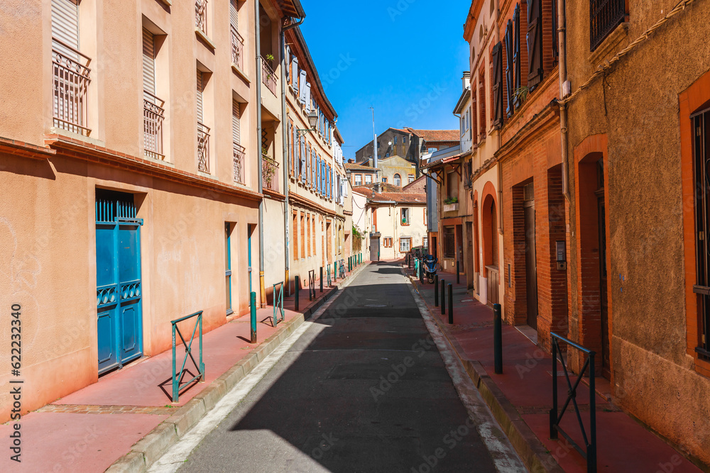 Street in old Toulouse town, Occitanie region, France, South Europe.