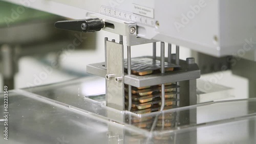 Pharmaceutical industry close up. Pills and tablets production. Medical factory equipment