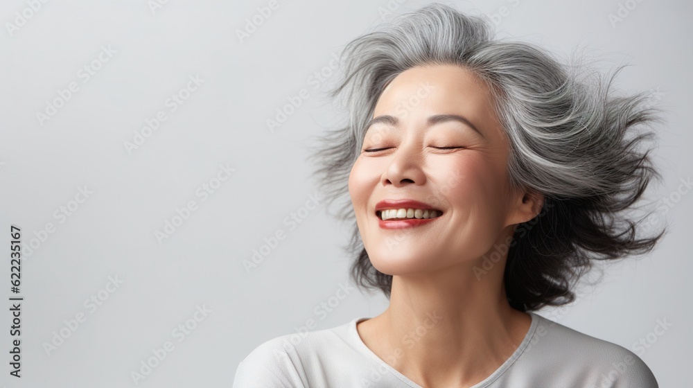 portrait of gorgeous happy joyful middle aged mature cheerful asian woman, senior older 50s gray haired lady eyes closed isolated on white. Ads of replenishing antiaging skin and hair care, generative portrait of gorgeous happy joyful middle aged mature cheerful asian woman, senior older 50s gray haired lady eyes closed isolated on white. Ads of replenishing antiaging skin and hair care, generative
