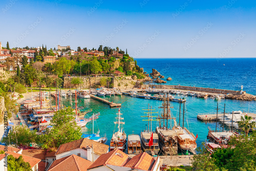 Fototapeta premium Old town Kaleici in Antalya, Turkey. Bay with ships and boats in summer