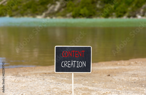 Time for content creation symbol. Concept words Content creation on beautiful black blackboard. Beautiful mountain lake background. Business time for content creation concept. Copy space.