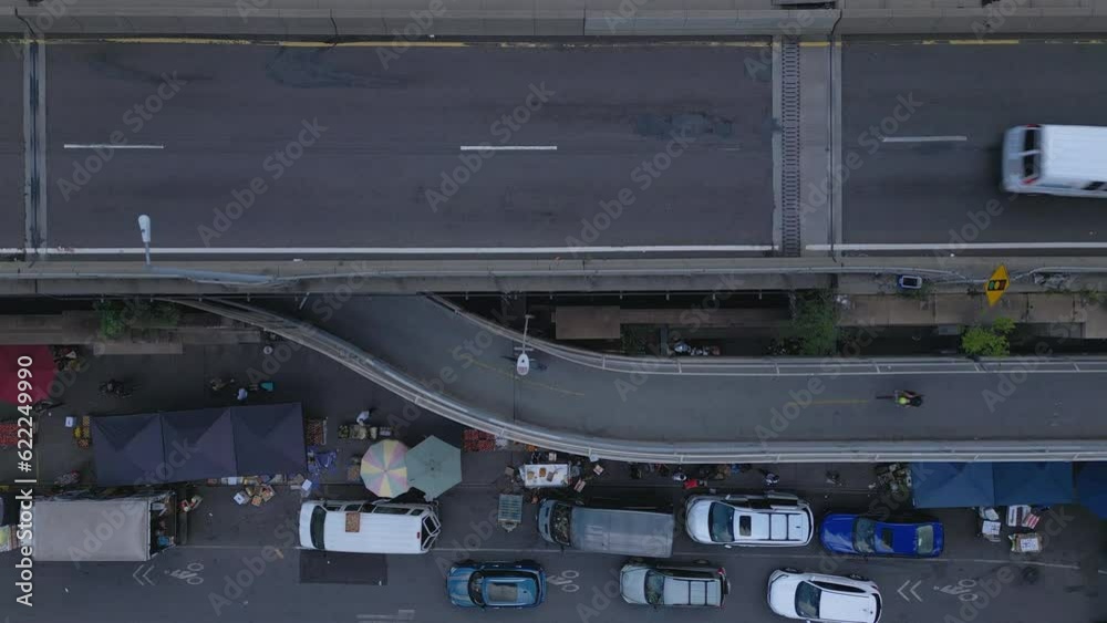 alt overhead view of car and bike lanes leading to Manhattan Bridge in NYC alt overhead view of car and bike lanes leading to Manhattan Bridge in NYC