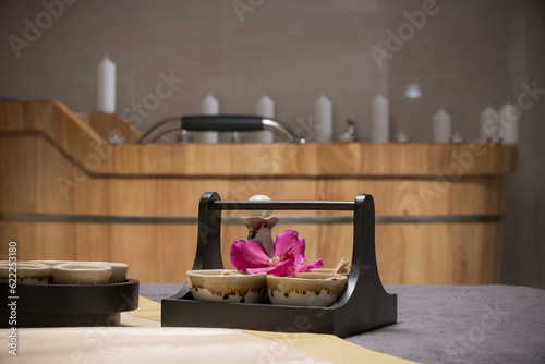 Natural treatments herbs treatment and candles in spa salon.