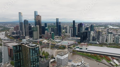 Melbourne Australia City CBD Aerial drone view with buildings Yarra river crown casino eureka skydeck and Melbourne Convention and Exhibition Centre on a nice overcast day. photo