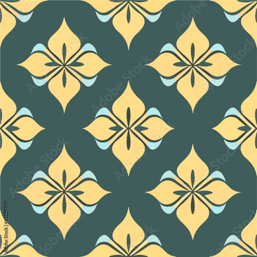 Vibrant yellow and green tile adorned with an art nouveau pattern. The intricate design adds a touch of beauty to any space.