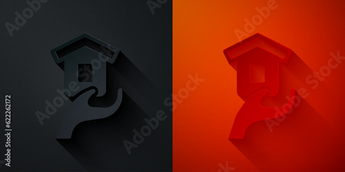 Paper cut Shelter for homeless icon isolated on black and red background. Emergency housing, temporary residence for people, bums and beggars without home. Paper art style. Vector