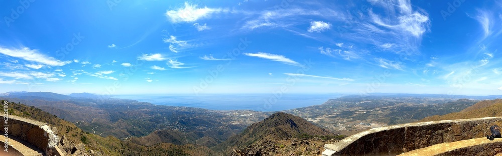 panorama view from the Pico de Los Reales over the coastline of the Costa del Sol towards the Mediterranen Sea, Paraje Natural Los Reales de Sierra Bermeja, Estepona, Andalusia, Malaga, Spain