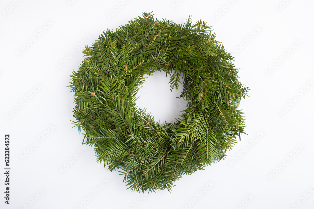 Christmas ring or wreath on the white background. Top view. Close-up. Christmas ring or wreath on the white background. Top view. Close-up.