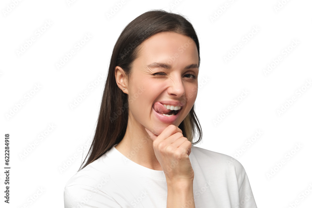 Young woman smiling and winking, looking at camera Young woman smiling and winking, looking at camera