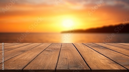 Empty wooden table top with blur background of Sunset time