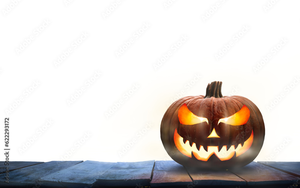 A single lit Jack-o-Lantern, halloween pumpkin lantern on a wooden product display table with an isolated transparent background.