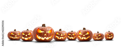 A group of eight lit spooky halloween pumpkins, Jack O Lantern with evil face and eyes isolated against a transparent background.