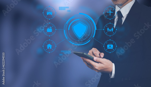 Obraz na plátně Safety of life, businessmen who are choosing to buy insurance covering travel, business, life worthwhile through the Internet