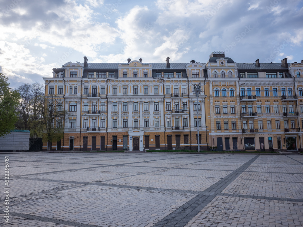 empty wide square and historical buildings in front of saint sophia cathedral in the evening