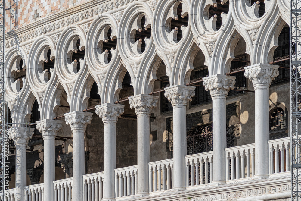 Architectural detail with the columns of Doge's Palace, in Venice, Italy