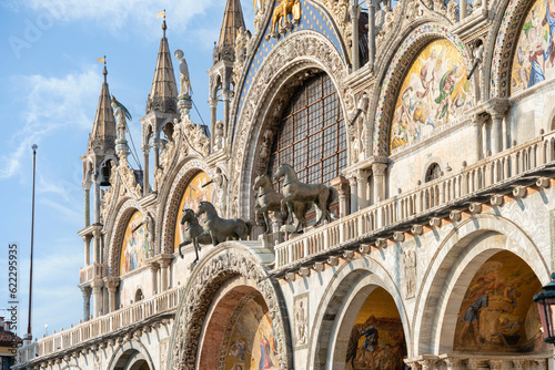 Architectural detail with the facade of Saint Marks Basilica in Venice, Italy.,