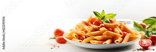 Italian macaroni pasta with tomato sauce on white background. Banner top view. Copy space. Panorama view photo