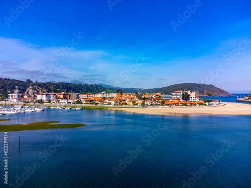 Aerial panoramic view, vacation on Costa Verde, Green coast of Asturias, Ribadesella village with sandy beaches, North of Spain
