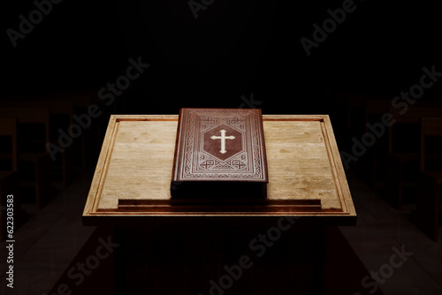 Beautiful Holy Bible on a wooden table against a bright white background. Gospel