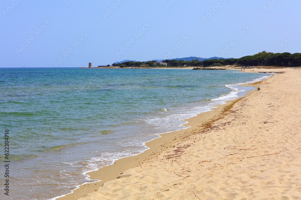 San Giovanni beach (Spiaggia di San Giovanni). Sandy beach in San Giovanni di Posada in Sardinia island, Italy. San Giovanni beach (Spiaggia di San Giovanni). Sandy beach in San Giovanni di Posada in Sardinia island, Italy.